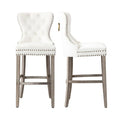 Carter Set of 2 Tufted Wingback Bar Stools with Nailhead Trim and Antique Grey Legs