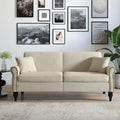 Upholstered Loveseat with Rolled Arms and 73 Nailhead Trim