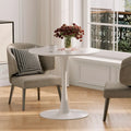Round Tulip Dining Table in Mid-Century Modern Style