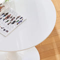 Round Tulip Dining Table in Mid-Century Modern Style