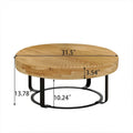Contemporary Round Wooden Coffee Table with Intricate Carving and Metal Legs